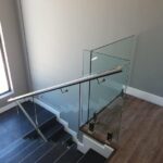 12 mm Clear glass + 50 mm dia mounted hand rail