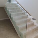 12 mm Clear glass + 50 mm dia mounted hand rail